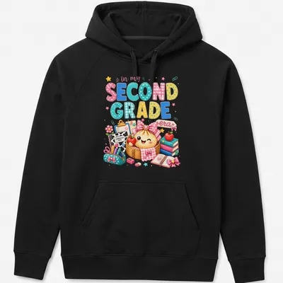 Kawaii style T-shirt featuring a dumpling girl and colorful text about second grade — printed on a unisex hoodie