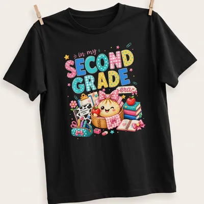 Kawaii style T-shirt featuring a dumpling girl and colorful text about second grade