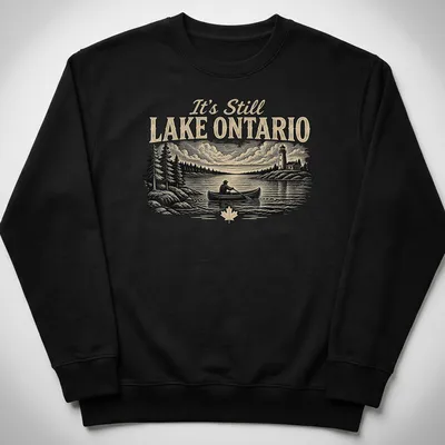 Vintage style t-shirt featuring Lake Ontario canoeing design in black, cream, and green — printed on a unisex sweatshirt