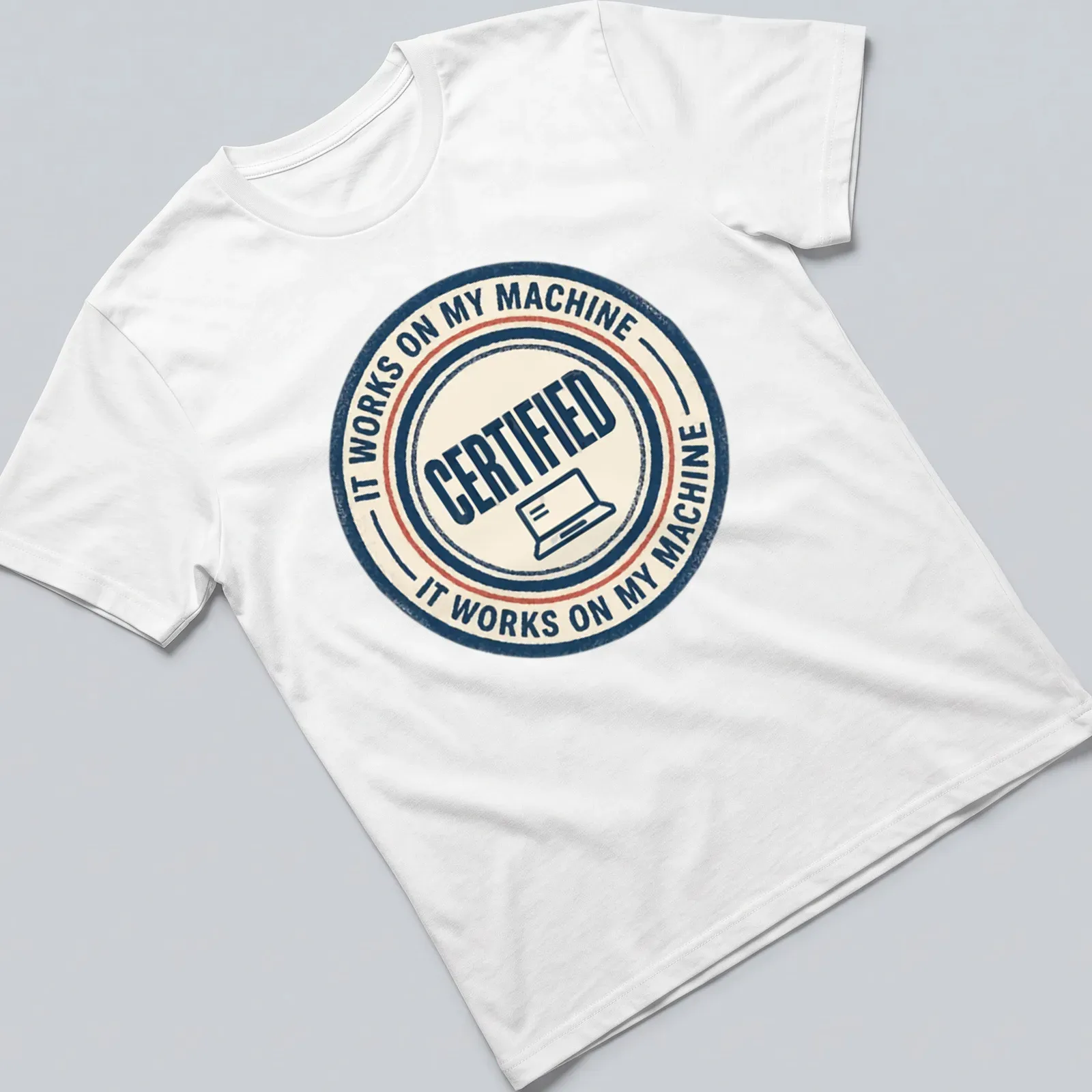 Retro distressed IT WORKS ON MY MACHINE laptop seal — printed on a unisex t-shirt