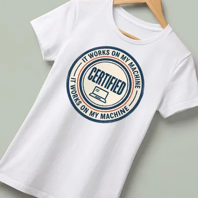 Retro distressed IT WORKS ON MY MACHINE laptop seal — printed on a women's shirt