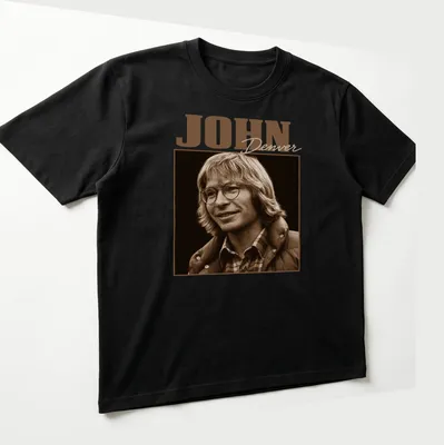 Vintage portrait of John Denver in brown and beige on a black — printed on a unisex t-shirt (angled view)