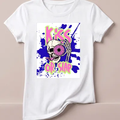 Skeleton humor graphic with donut and 'Kiss or Slap' text — printed on a women's shirt