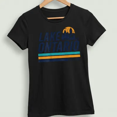 Retro vintage Lake Ontario T-shirt with lighthouse illustration and established date — printed on a women's shirt
