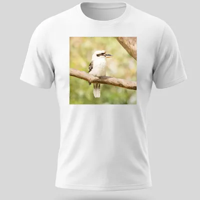 Realistic photo of a laughing kookaburra bird on a branch — printed on a unisex t-shirt