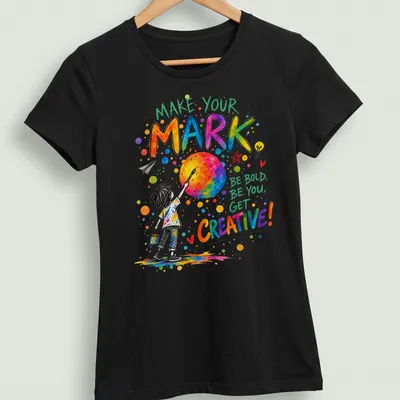 Colorful watercolor graphic of a child painting a planet with inspirational text. — printed on a women's shirt