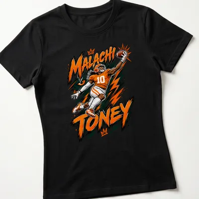 Dynamic comic style shirt featuring football player Malachi Toney in orange and black. — printed on a women's shirt
