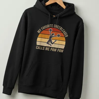 Retro style shirt with text about being a proud Paw Paw and a cheerleader graphic — printed on a unisex hoodie