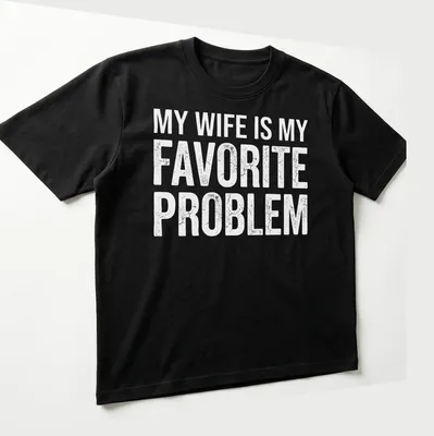 Distressed text stating 'My Wife Is My Favorite Problem' on a white shirt. — printed on a unisex t-shirt (angled view)