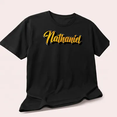 Personalized Nathaniel t-shirt with bold gold script on black. — printed on a unisex t-shirt (angled view)