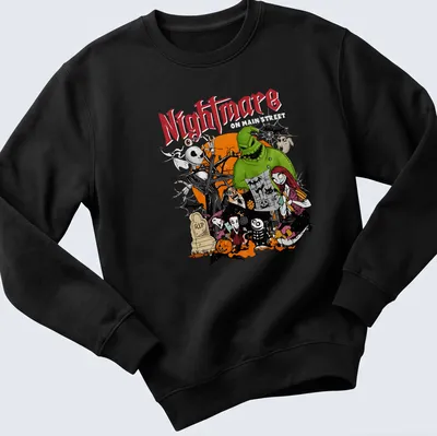 Cartoon Halloween characters with the word Nightmare in black and orange — printed on a unisex sweatshirt