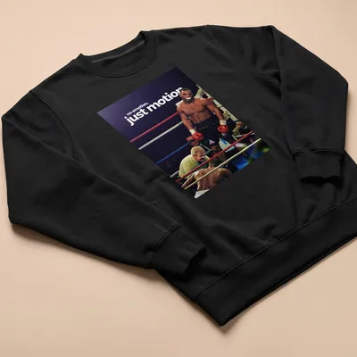 Vintage style Mike Tyson boxing tee with bold text and colors — printed on a unisex sweatshirt