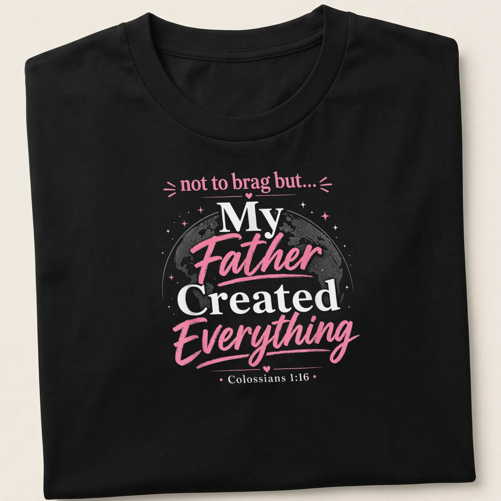 Playful typography t-shirt with globe and text from Colossians 1:16 — printed on a unisex t-shirt