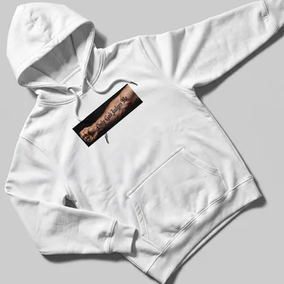 Bold script t-shirt with tattoo design reading 'Only God Judges Me' on an arm — printed on a unisex hoodie