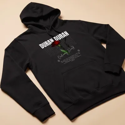 Artistic red rose design with lyrics from Duran Duran's 'Ordinary World' — printed on a unisex hoodie