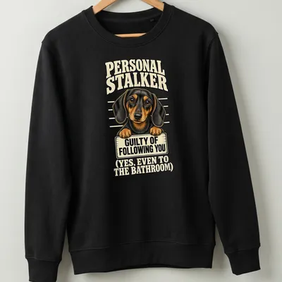 Vintage illustration of a dachshund with humorous text about companionship — printed on a unisex sweatshirt