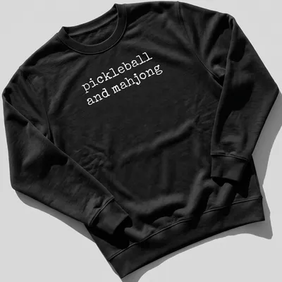 T-shirt featuring simple text design of pickleball and mahjong — printed on a unisex sweatshirt