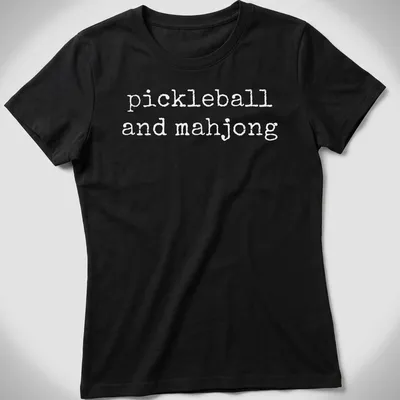 T-shirt featuring simple text design of pickleball and mahjong — printed on a women's shirt