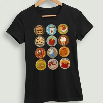 Kawaii cartoon McChicken characters and fast food icons with vibrant colors — printed on a women's shirt