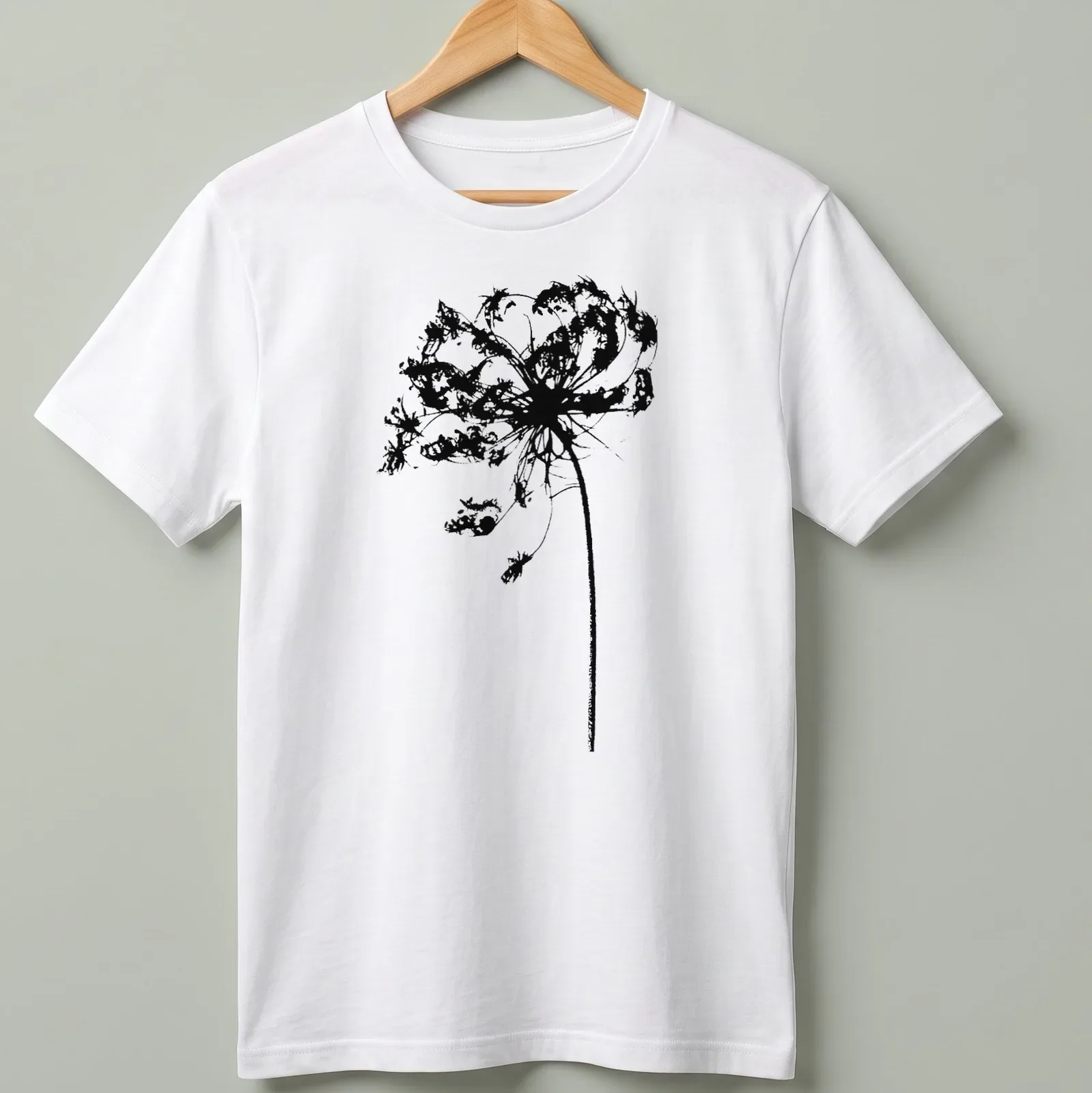 Silhouette of Queen Anne's Lace wildflower in black on white background — printed on a unisex t-shirt