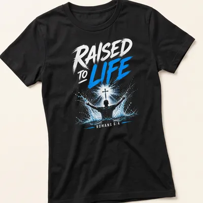 Illustrative baptism T-shirt with a person, cross, and splash effects in blue and white — printed on a women's shirt