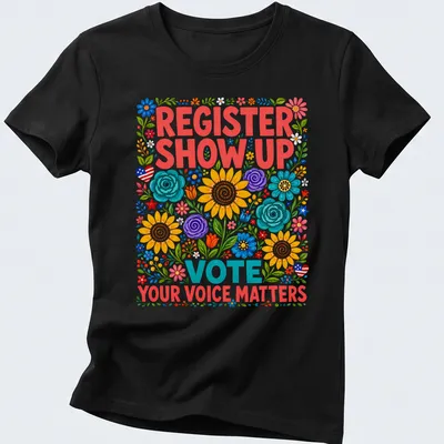 Floral design T-shirt featuring colorful hand-drawn text promoting civic engagement — printed on a women's shirt
