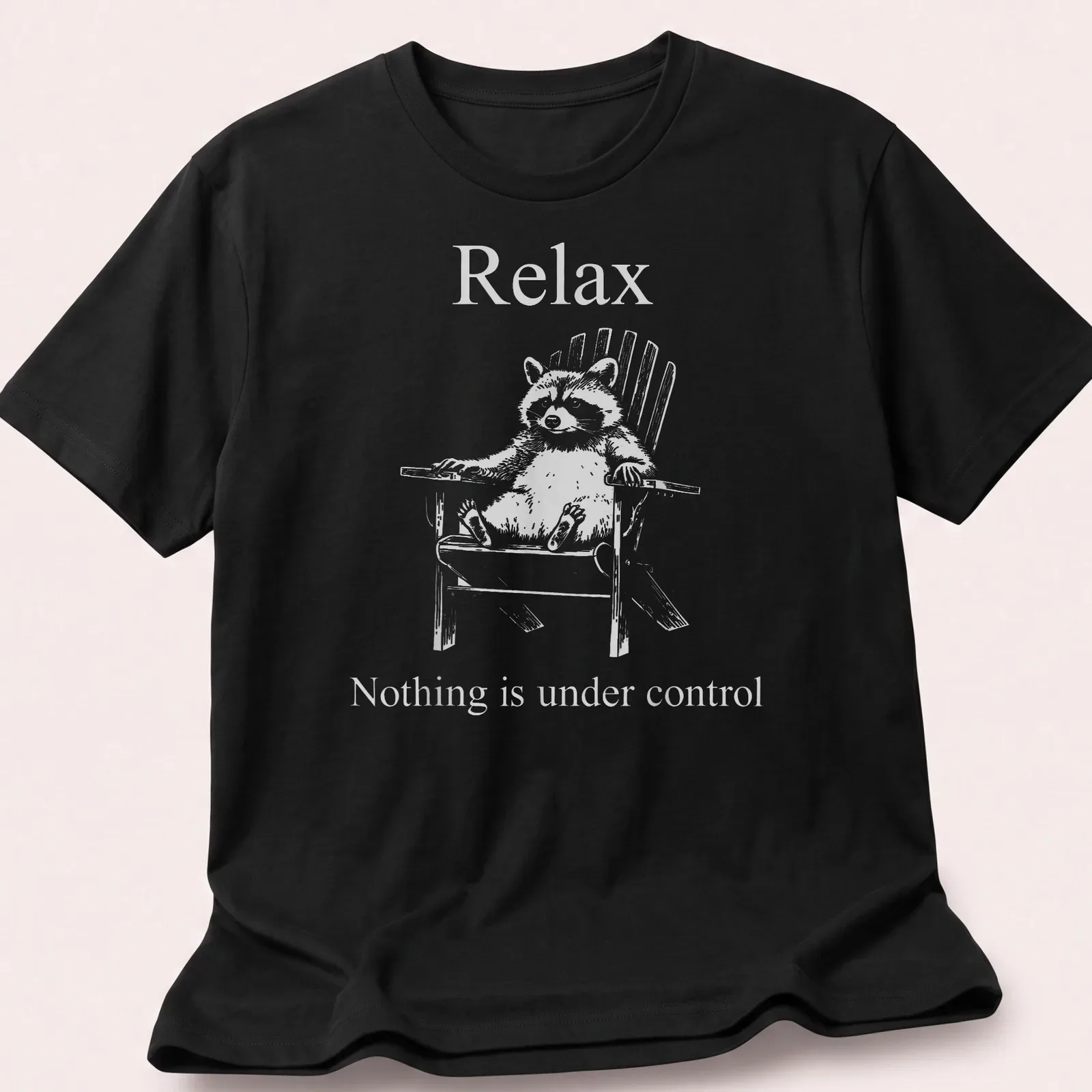 Vintage illustration of a funny raccoon with humorous text about control — printed on a unisex t-shirt