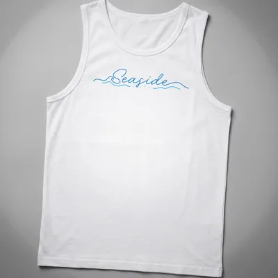 Cursive script design featuring the word Seaside over wave imagery in blue and white — printed on a tank top