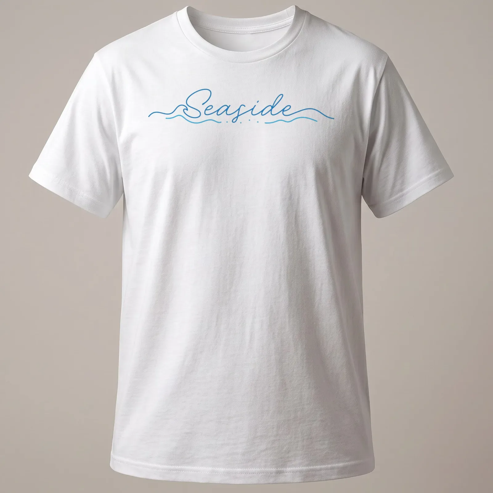 Cursive script design featuring the word Seaside over wave imagery in blue and white — printed on a unisex t-shirt