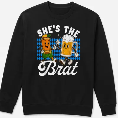 Kawaii cartoon design of a beer mug and sausage with text 'SHE'S THE BRAT' — printed on a unisex sweatshirt