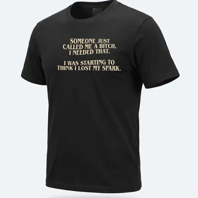 Bold typography t-shirt with a humorous empowering message in cream and light beige