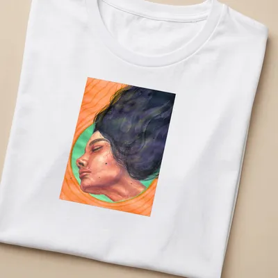 Watercolor portrait of a surreal woman with the word 'Stillness' in orange and green hues. — printed on a women's shirt