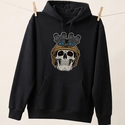Bold cartoon of a tactical skull with a helmet and goggles, colored in black, tan, red, blue, white. — printed on a unisex hoodie