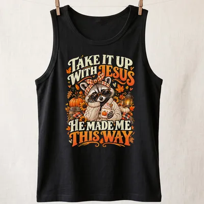 Vintage autumn-style T-shirt featuring a raccoon and playful text about Jesus. — printed on a tank top
