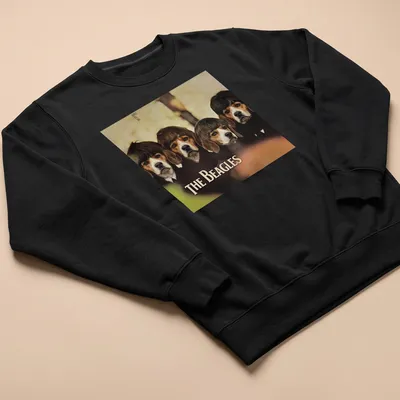 Vintage style shirt featuring humorous beagle dogs and 'THE BEAGLES' text — printed on a unisex sweatshirt