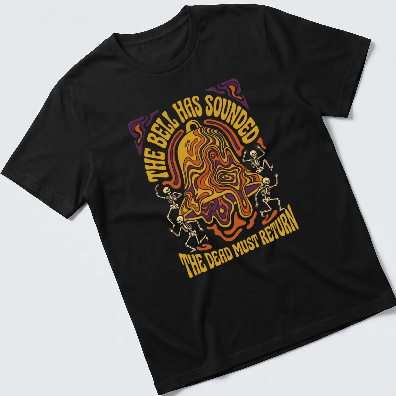 Psychedelic design with skeletons and bell, featuring vibrant colors in orange, purple, yellow. — printed on a unisex t-shirt