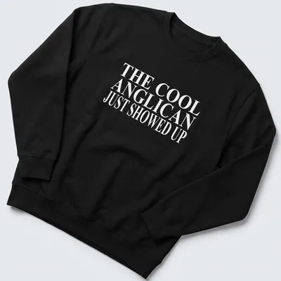 Bold typography T-shirt featuring Anglican Christian text in white — printed on a unisex sweatshirt