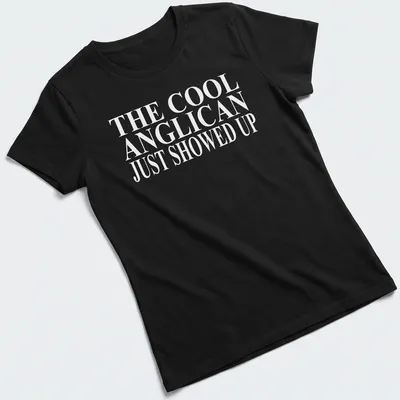 Bold typography T-shirt featuring Anglican Christian text in white — printed on a women's shirt