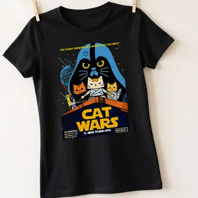 Retro cartoon cats dressed as sci-fi characters with colorful elements — printed on a women's shirt