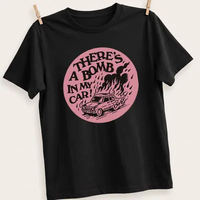 Bold graphic t-shirt featuring cartoon car with the text 'There's A Bomb In My Car!' — printed on a unisex t-shirt