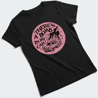 Bold graphic t-shirt featuring cartoon car with the text 'There's A Bomb In My Car!' — printed on a women's shirt