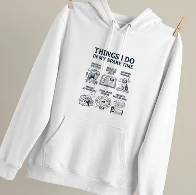 Vintage illustration of an Old English Sheepdog with printed text about dog activities — printed on a unisex hoodie