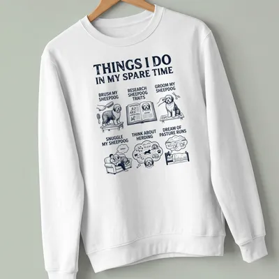 Vintage illustration of an Old English Sheepdog with printed text about dog activities — printed on a unisex sweatshirt