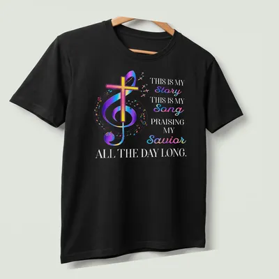 Colorful gradient T-shirt with faith message, cross, and musical notes — printed on a unisex t-shirt (angled view)