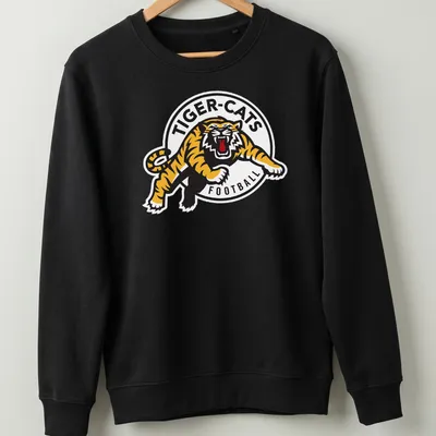 Hamilton Tiger-Cats logo t-shirt with bold black, yellow, and white graphics — printed on a unisex sweatshirt