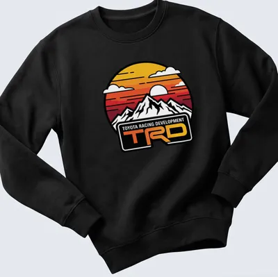 Retro circular print featuring mountains at sunset with Toyota Racing Development text — printed on a unisex sweatshirt