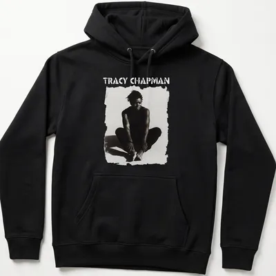 Black and white illustration of Tracy Chapman sitting with bold text below — printed on a unisex hoodie