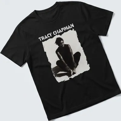 Black and white illustration of Tracy Chapman sitting with bold text below — printed on a unisex t-shirt