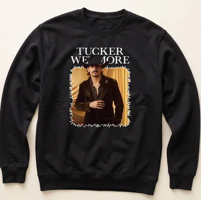 Fashion portrait T-shirt featuring a man in a cowboy hat and the name Tucker Wetmore — printed on a unisex sweatshirt
