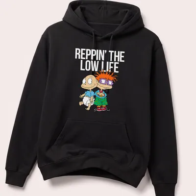 Cartoon T-shirt featuring two playful babies with joyful expressions — printed on a unisex hoodie